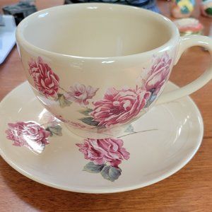 Teacup and saucer with beautiful flowers